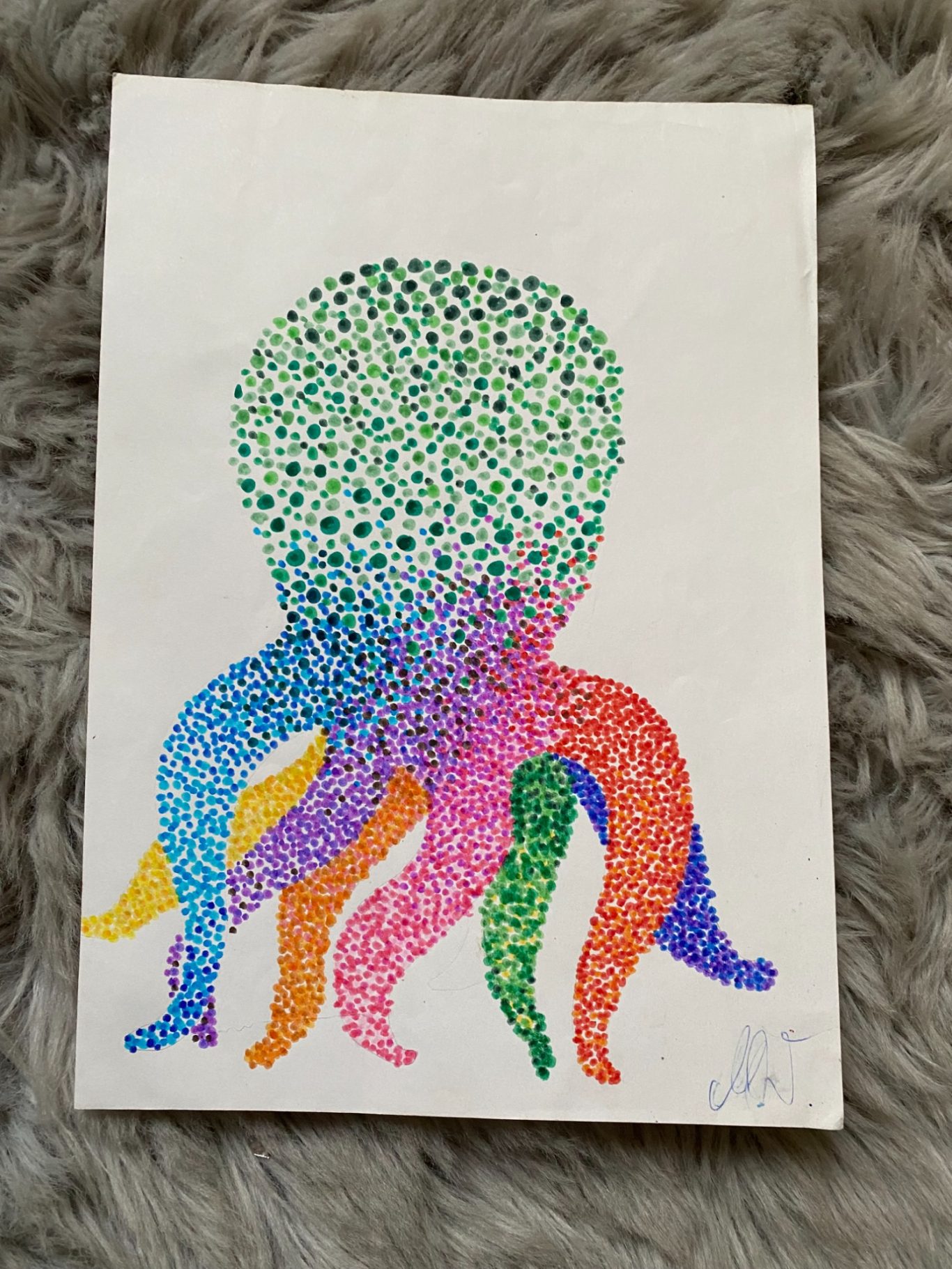 Bunte Zeichnung eines Octopuses mit geschwungenen Tentakeln in Regenbogenfarben.